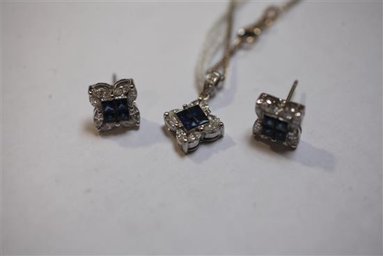A sapphire and diamond square-set pendant on 18ct white gold fine chain and a pair of earrings en suite, pendant 11.mm.
